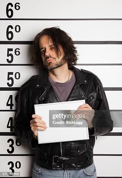 mugshot of a man - police line up stock pictures, royalty-free photos & images