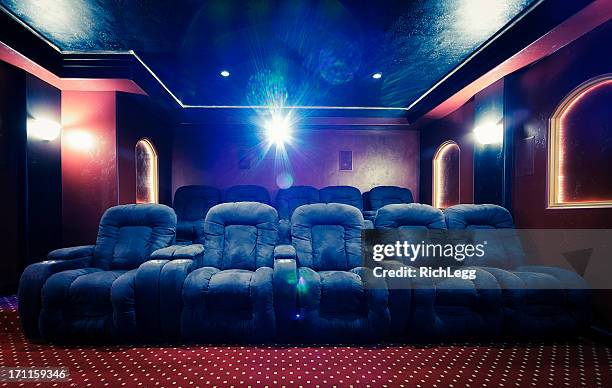 home theater room with lens flare - home cinema stockfoto's en -beelden