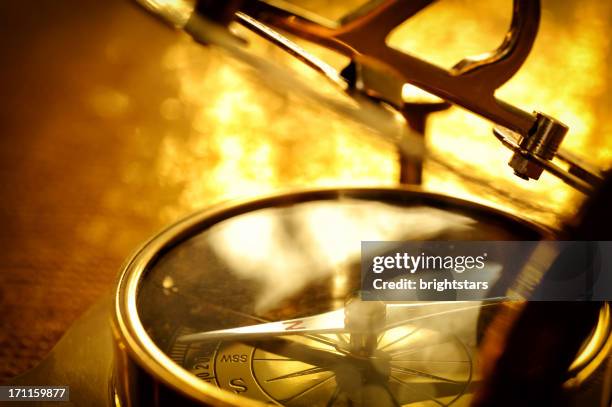 yellow compass - ancient sundials stock pictures, royalty-free photos & images