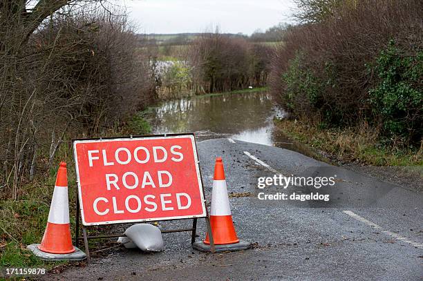 floods ahead - flood warning stock pictures, royalty-free photos & images