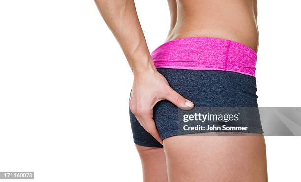 female buttocks wearing workout clothing - shapely legs stock pictures, royalty-free photos & images