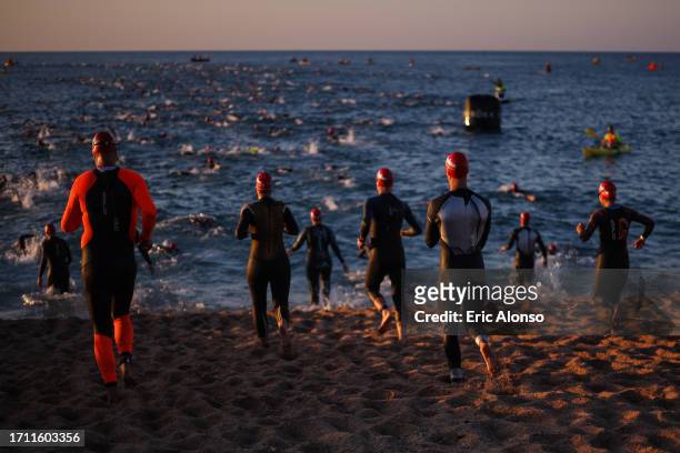Athletes starts the swim leg during IRONMAN 70.3 Barcelona on October 01, 2023 in Calella, Spain.