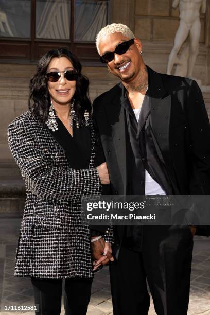 Cher and Alexander Edwards attend the Valentino Womenswear Spring/Summer 2024 show as part of Paris Fashion Week on October 01, 2023 in Paris, France.