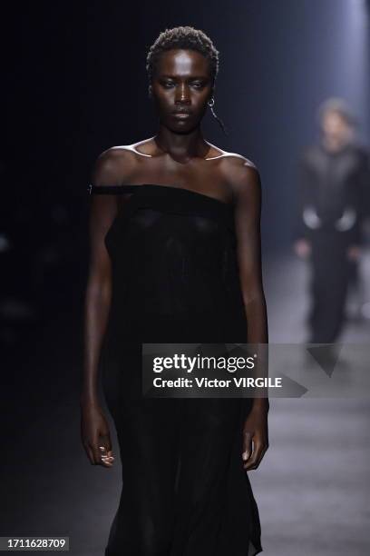 Model walks the runway during the Ann Demeulemeester Ready to Wear Spring/Summer 2024 show as part of the Paris Fashion Week on September 30, 2023 in...