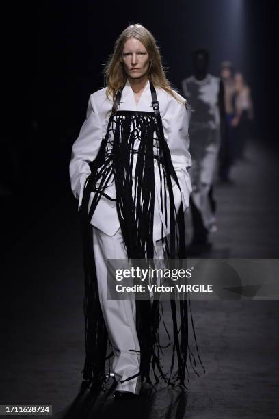 Kirsten Owen walks the runway during the Ann Demeulemeester Ready to Wear Spring/Summer 2024 show as part of the Paris Fashion Week on September 30,...