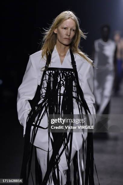 Kirsten Owen walks the runway during the Ann Demeulemeester Ready to Wear Spring/Summer 2024 show as part of the Paris Fashion Week on September 30,...