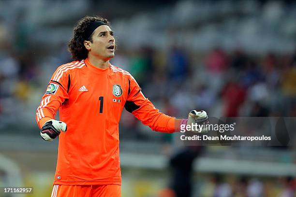 Guillermo Ochoa of Mexico reacts during the FIFA Confederations Cup Brazil 2013 Group A match between Japan and Mexico at Estadio Mineirao on June...