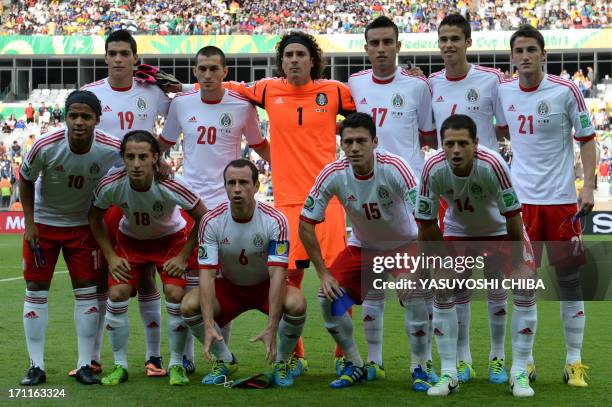 Mexico's players pose for pictures before the start of their FIFA Confederations Cup Brazil 2013 Group A football match against Japan, at the...