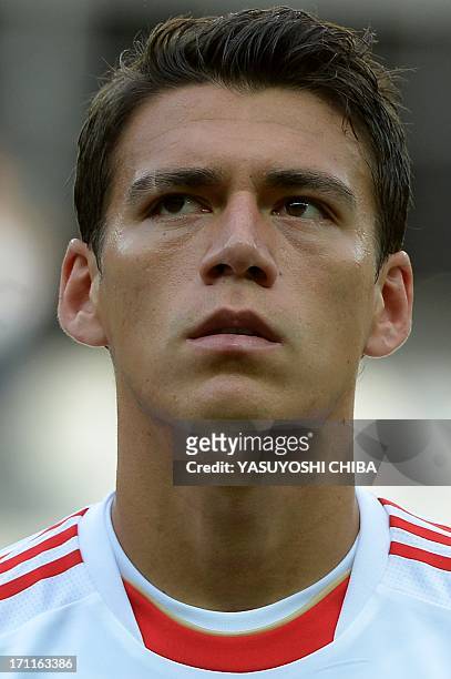 Mexico's defender Hector Moreno listens to the national anthems before the start of the FIFA Confederations Cup Brazil 2013 Group A football match...