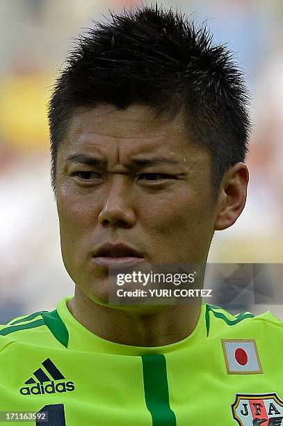 Japan's goalkeeper Eiji Kawashima listens to the national anthems before the start of the FIFA Confederations Cup Brazil 2013 Group A football match...