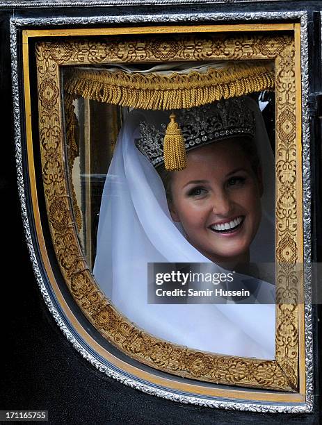 Melissa Percy arrives by carraige for her wedding to Thomas Staubenzee at Alnwick Castle following their marriage on June 22, 2013 in Alnwick,...