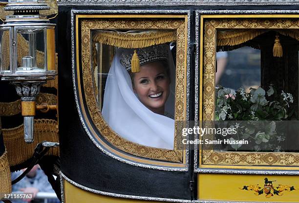 Melissa Percy arrives by carraige for her wedding to Thomas Staubenzee at Alnwick Castle following their marriage on June 22, 2013 in Alnwick,...