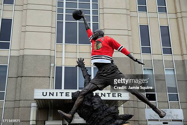 Chicago Blackhawks jersey is seen on the statue of former Chicago Bull and Basketball Hall of Famer Michael Jordan prior to the Blackhawks hosting...