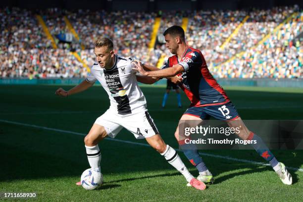 Sandi Lovric of Udinese and Mattia Bani of Genoa during the Serie A TIM match between Udinese Calcio and Genoa CFC at Bluenergy Stadium on October...