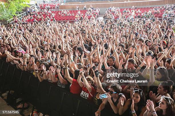 View of the crowd as Forever The Sickest Kids performs at the Vans Warped Tour on June 15, 2013 in Seattle, Washington.