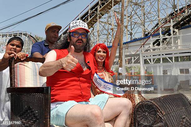 Judah Friedlander and Carole Radziwill attend the 2013 Mermaid Parade at Coney Island on June 22, 2013 in New York City.