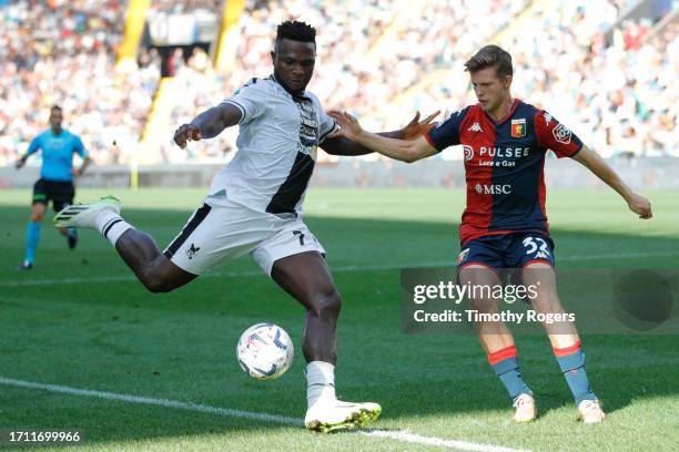 Isaac Success of Udinese and Morten Frendrup of Genoa during the Serie A TIM match between Udinese Calcio and Genoa CFC at Bluenergy Stadium on...