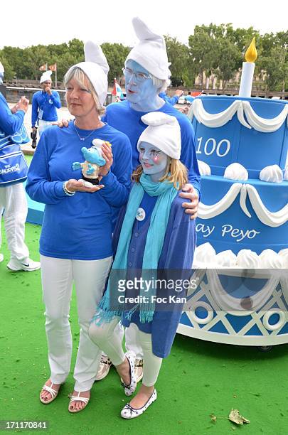 Smurf creator /cartoonist Peyo 's daughter Veronique Culliford, her husband Marc Guerin and their daughter Nina Guerin attend the 'Global Smurfs Day'...