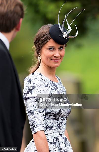 Pippa Middleton attends the wedding of Lady Melissa Percy and Thomas Van Straubenzee at St Michael's Church on June 22, 2013 in Alnwick, England.