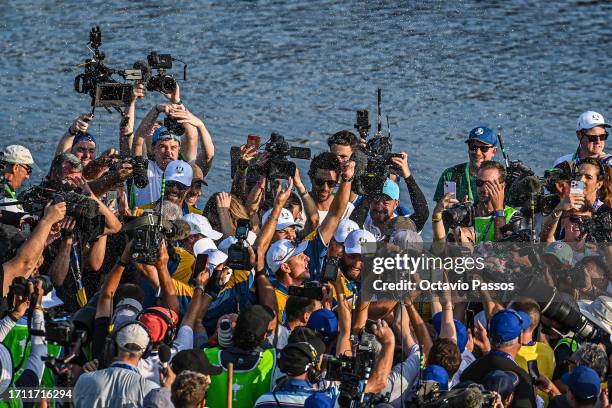 Justin Rose of Team Europe celebrates the Ryder Cup victory with 16 and a half to 11 and a half win following the during the Sunday singles matches...