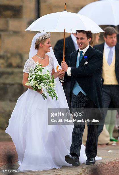Lady Melissa Percy and Thomas Van Straubenzee leave St Michael's Church after their wedding on June 22, 2013 in Alnwick, England.