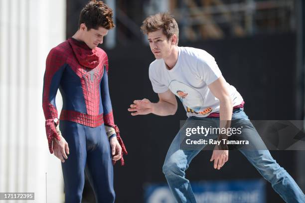 Actor Andrew Garfield rehearses a scene with his stunt double William Spencer at the "The Amazing Spiderman 2" movie set in Madison Square Park on...