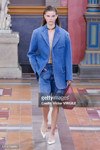 Model walks the runway during the Valentino Ready to Wear Spring/Summer 2024 fashion show as part of the Paris Fashion Week on October 1, 2023 in...