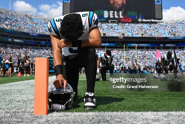 Bryce Young of the Carolina Panthers prays before a game against the Minnesota Vikings at Bank of America Stadium on October 01, 2023 in Charlotte,...