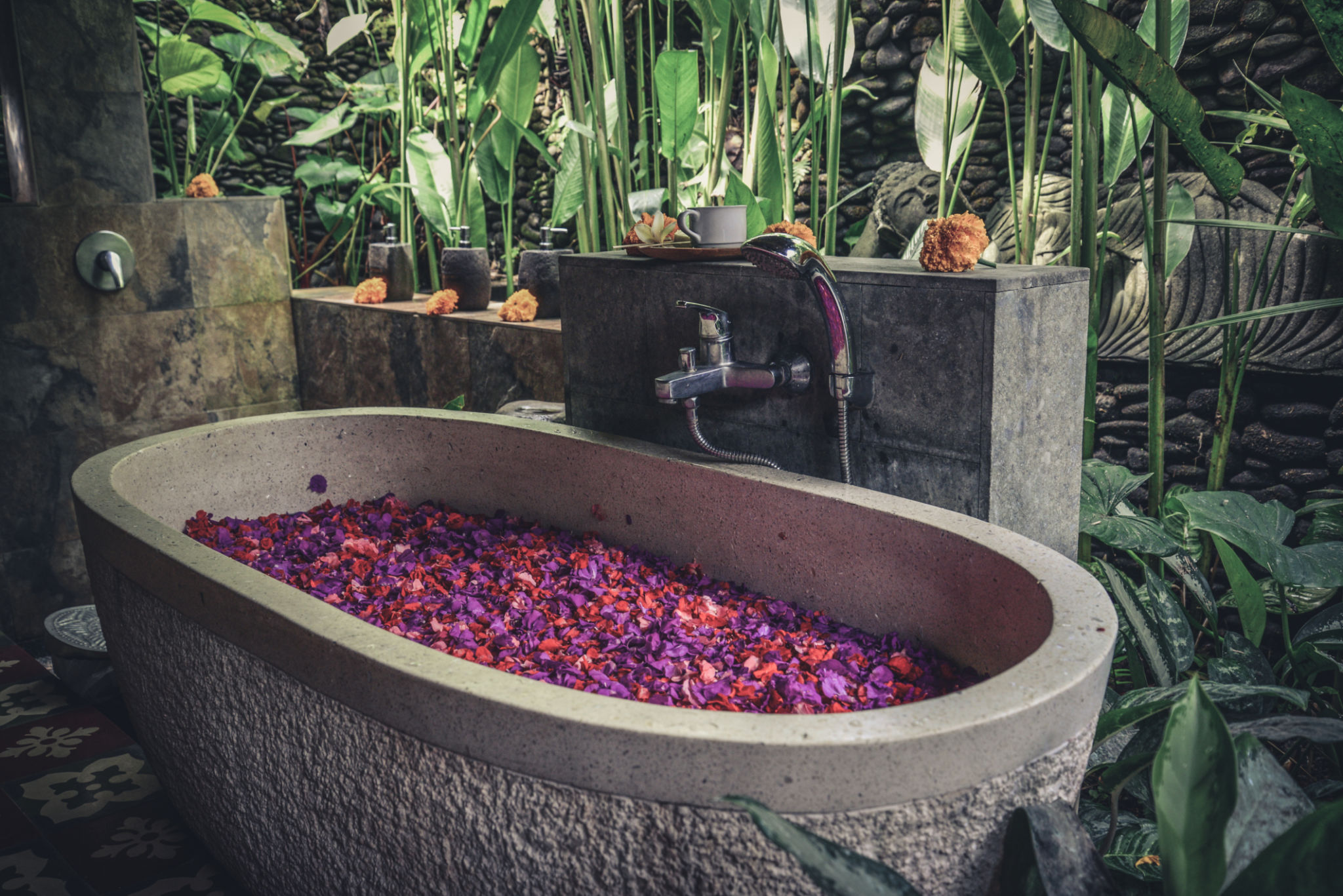 Bath tub with flower petals in Bali, Indonesia with Baie Property Group Bath tub with flower petals in Bali, Indonesia with Baie Property Group