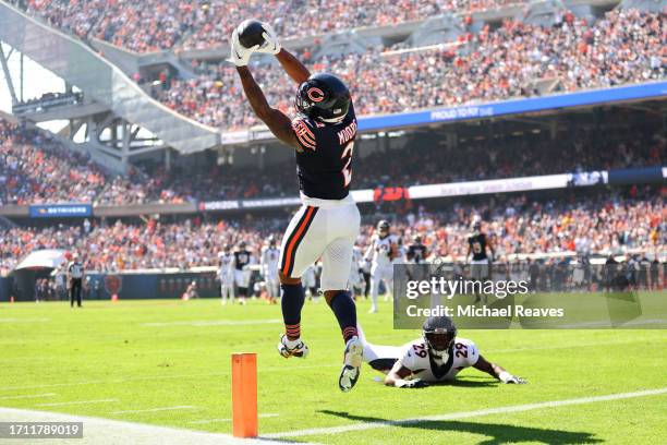 Moore of the Chicago Bears scores a touchdown against the Denver Broncos during the second quarter at Soldier Field on October 01, 2023 in Chicago,...