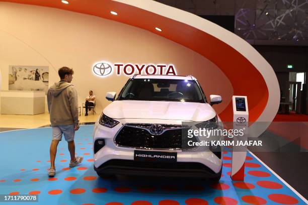 Toyota highlander hybrid SUV is displayed at the Geneva International Motor Show at the Doha Exhibition and Convention Center in Doha on October 7,...
