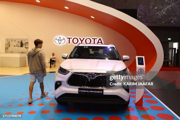 Toyota highlander hybrid SUV is displayed at the Geneva International Motor Show at the Doha Exhibition and Convention Center in Doha on October 7,...