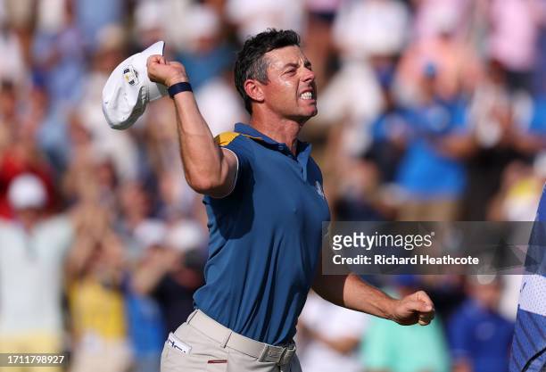 Rory McIlroy of Team Europe celebrates winning his match on the 17th green during the Sunday singles matches of the 2023 Ryder Cup at Marco Simone...
