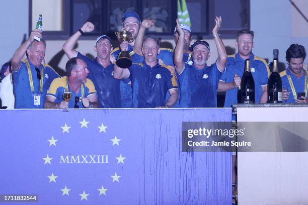 Rory McIlroy, Luke Donald, Captain of Team Europe and teammates celebrate following victory with 16 and a half to 11 and a half win following the...