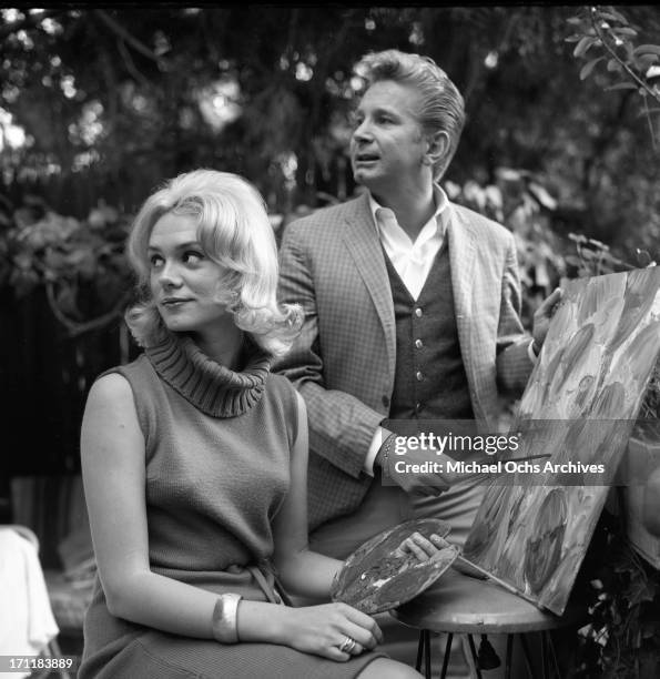 Singer/songwriter Jackie DeShannon poses for a portrait session at home with actor Kenny Miller in circa 1964 in Los Angeles, California.