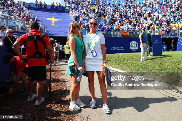 Olivia Peet , partner of Ludvig Aberg poses for a photo on the first tee during the Sunday singles matches of the 2023 Ryder Cup at Marco Simone Golf...