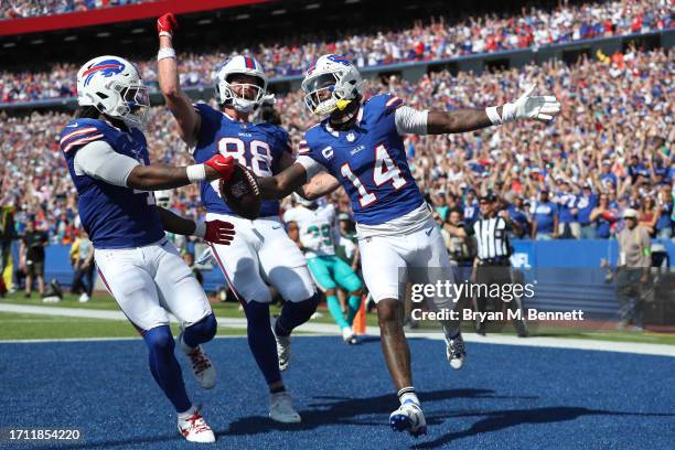 Stefon Diggs of the Buffalo Bills celebrates his touchdown reception against the Miami Dolphins during the second quarter at Highmark Stadium on...