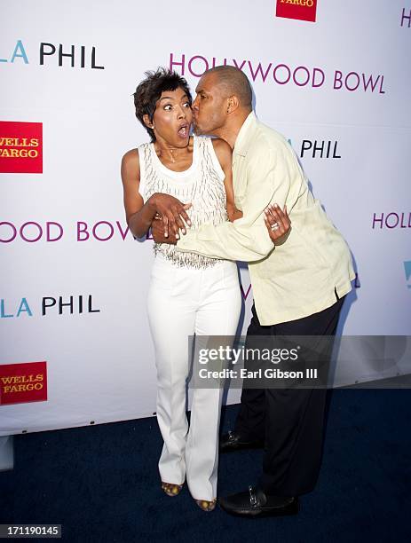 Angela Bassett is stunned by fellow actor Eriq La Salle at the Hollywood Bowl Hall Of Fame Opening Night at The Hollywood Bowl on June 22, 2013 in...