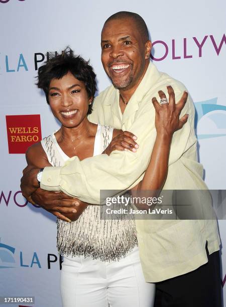 Actress Angela Bassett and actor Eriq La Salle attend the Hollywood Bowl opening night celebration at The Hollywood Bowl on June 22, 2013 in Los...