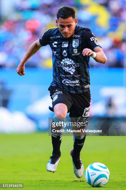 Raul Sandoval of Querétaro drives the ball during the 9th round match between Cruz Azul and Queretaro as part of the Torneo Apertura 2023 Liga MX at...