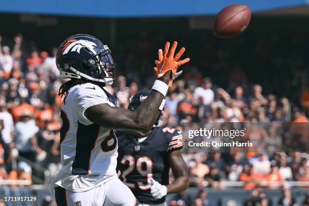 Brandon Johnson of the Denver Broncos makes a touchdown reception during the third quarter against the Chicago Bears at Soldier Field on October 01,...
