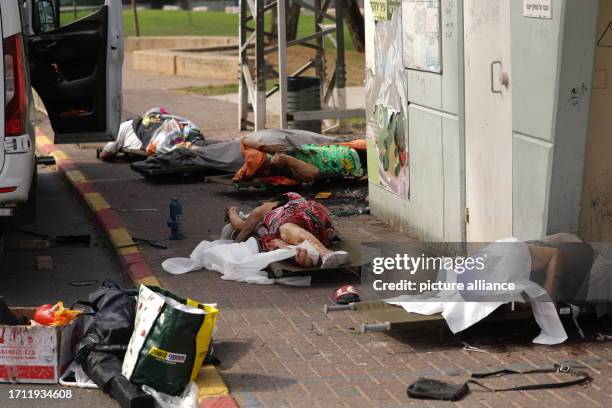 October 2023, Israel, Sderot: Bodies of dead Israelis lie on the ground following the attacks of Hamas. Palestinian militants in Gaza unexpectedly...