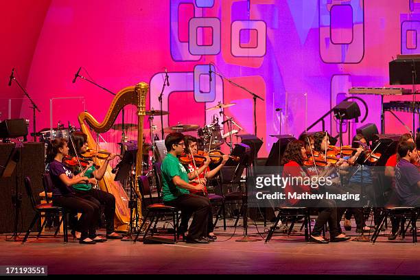 Members of the Youth Orchestra Los Angeles perform at Hollywood Bowl Opening Night Gala - Inside at The Hollywood Bowl on June 22, 2013 in Los...