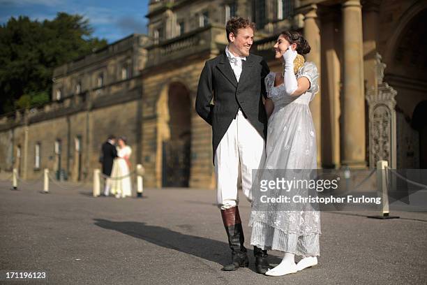 Regency costumed guests arrive for the the Pride and Prejudice Ball at Chatsworth House on June 22, 2013 in Chatsworth, England. To celebrate the...