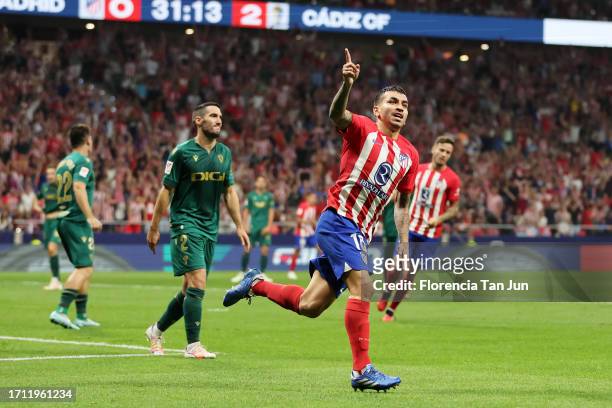 Angel Correa of Atletico Madrid celebrates after scoring the team's first goal during the LaLiga EA Sports match between Atletico Madrid and Cadiz CF...