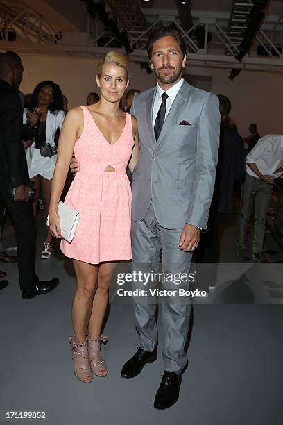 Henrik Lundqvist and Therese Andersson attend the Calvin Klein Collection show during Milan Menswear Fashion Week Spring Summer 2014 on June 23, 2013...