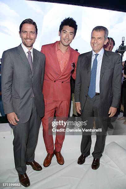 James Ferragamo, Godfrey Gao and Ferruccio Ferragamo attend the 'Salvatore Ferragamo' show as part of Milan Fashion Week Spring/Summer 2014 on June...