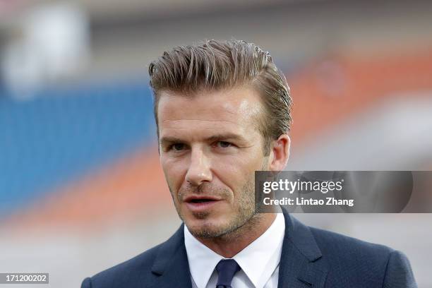 David Beckham looks on during his visit Hangzhou Huanglong Stadium on June 22, 2013 in Hangzhou, China.