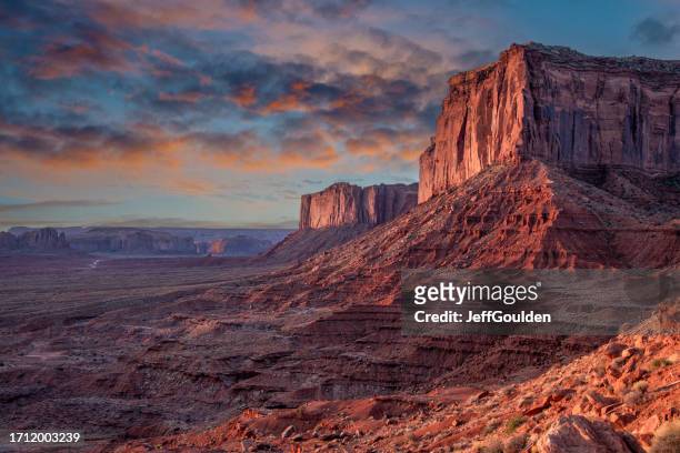 mitchell mesa at sunrise - monument valley stock pictures, royalty-free photos & images