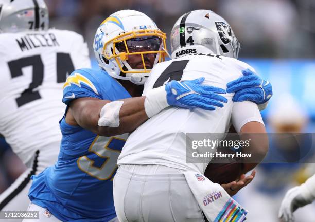 Khalil Mack of the Los Angeles Chargers sacks Aidan O'Connell of the Las Vegas Raiders during the first quarter at SoFi Stadium on October 01, 2023...